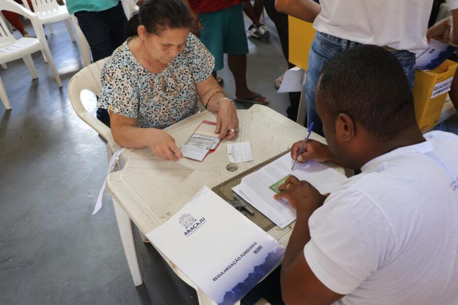 assinatura de contrato de concessão de imóveis no Residencial Lamarão